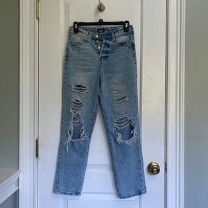Distressed denim jeans